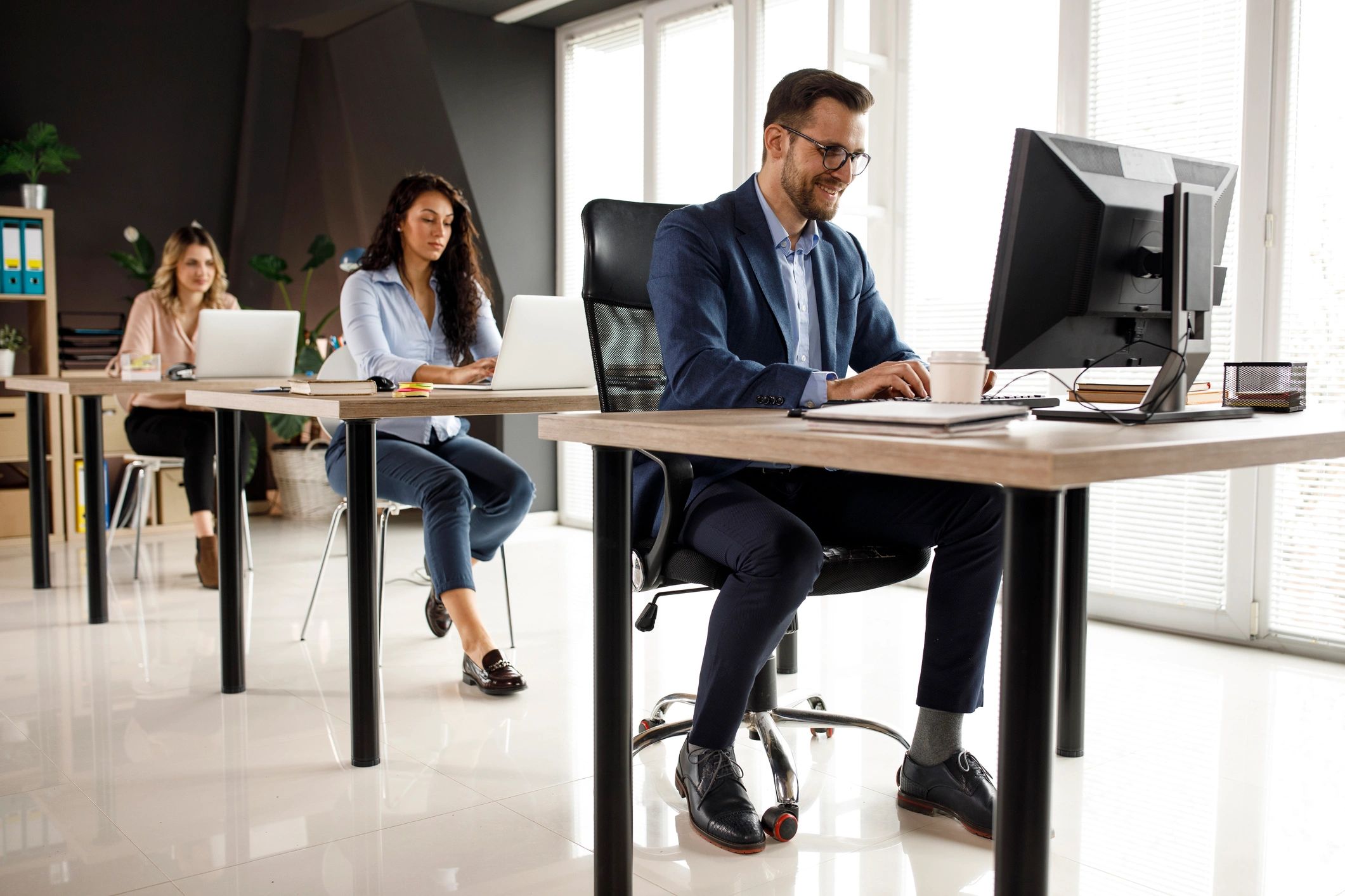 Business office team receiving IT support