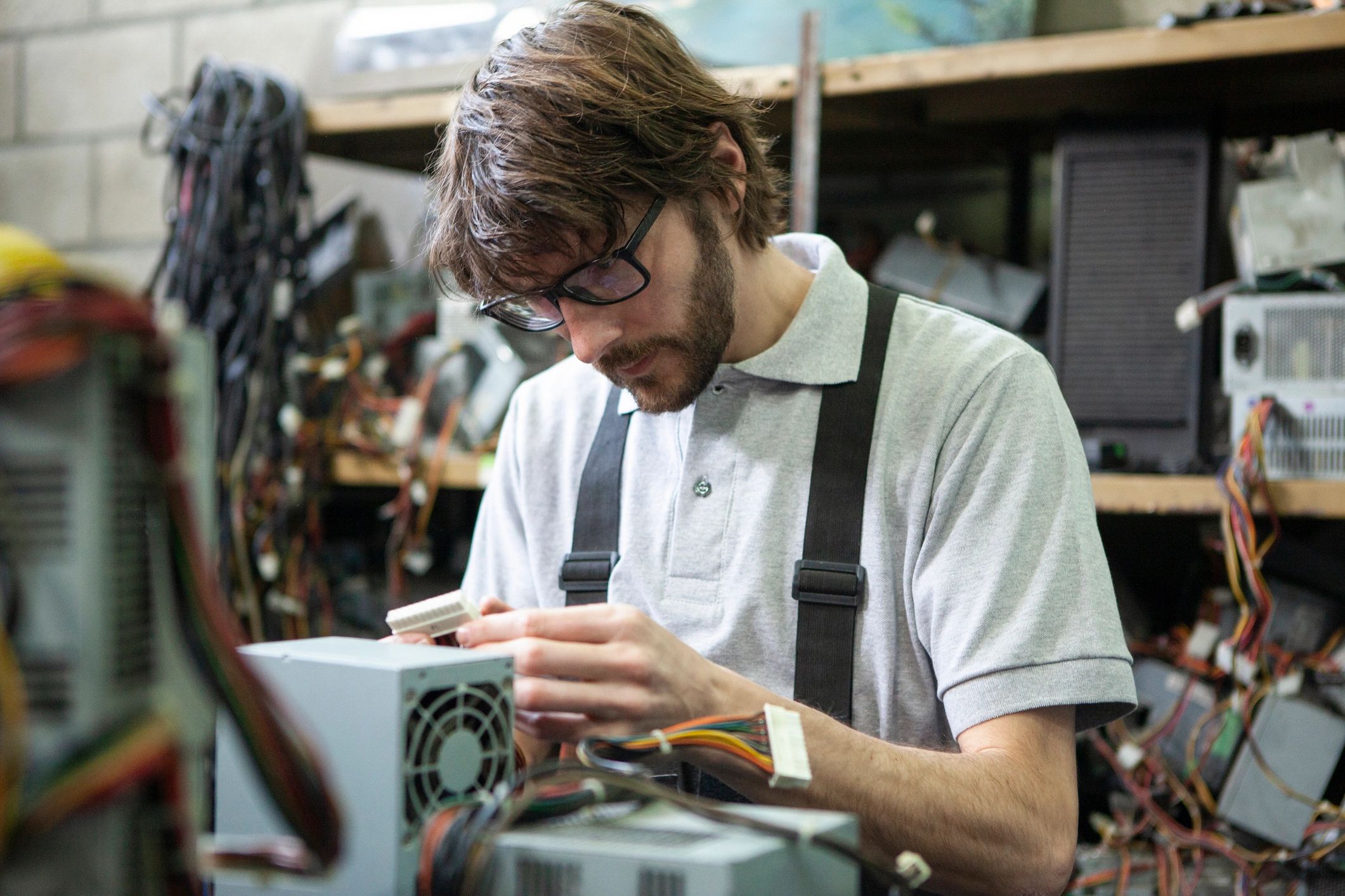 Technician checking computer components