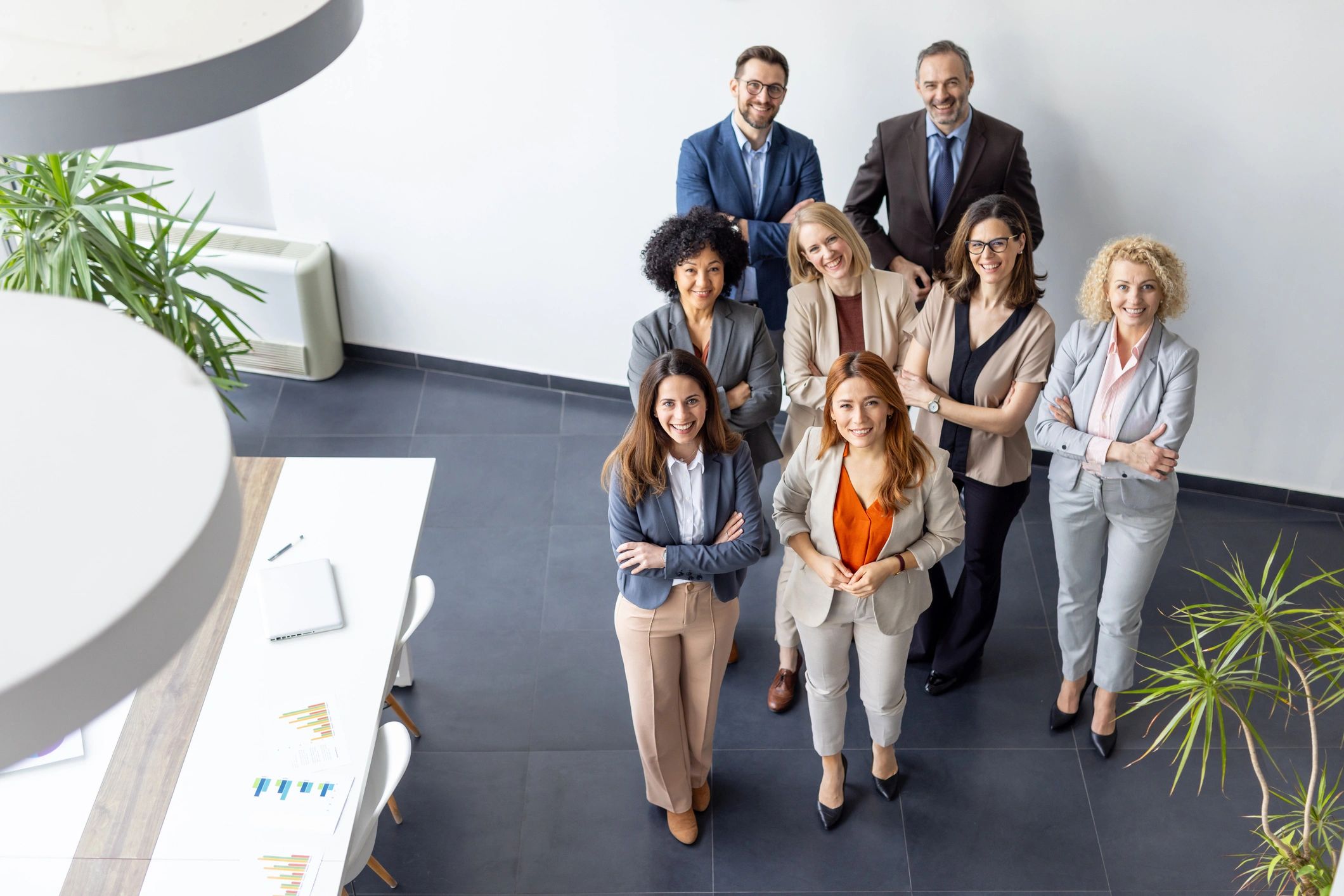 Professional IT support team standing together